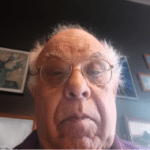 elderly man with glasses