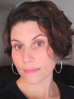 headshot of Aisha Kishta