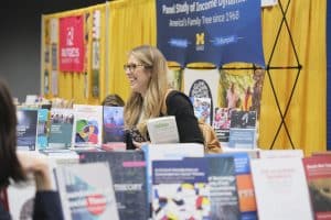 browsing-books-in-the-asa-annual-meeting-exhibit-hall