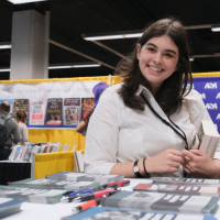 browsing-books-in-the-asa-annual-meeting-exhibit-hall